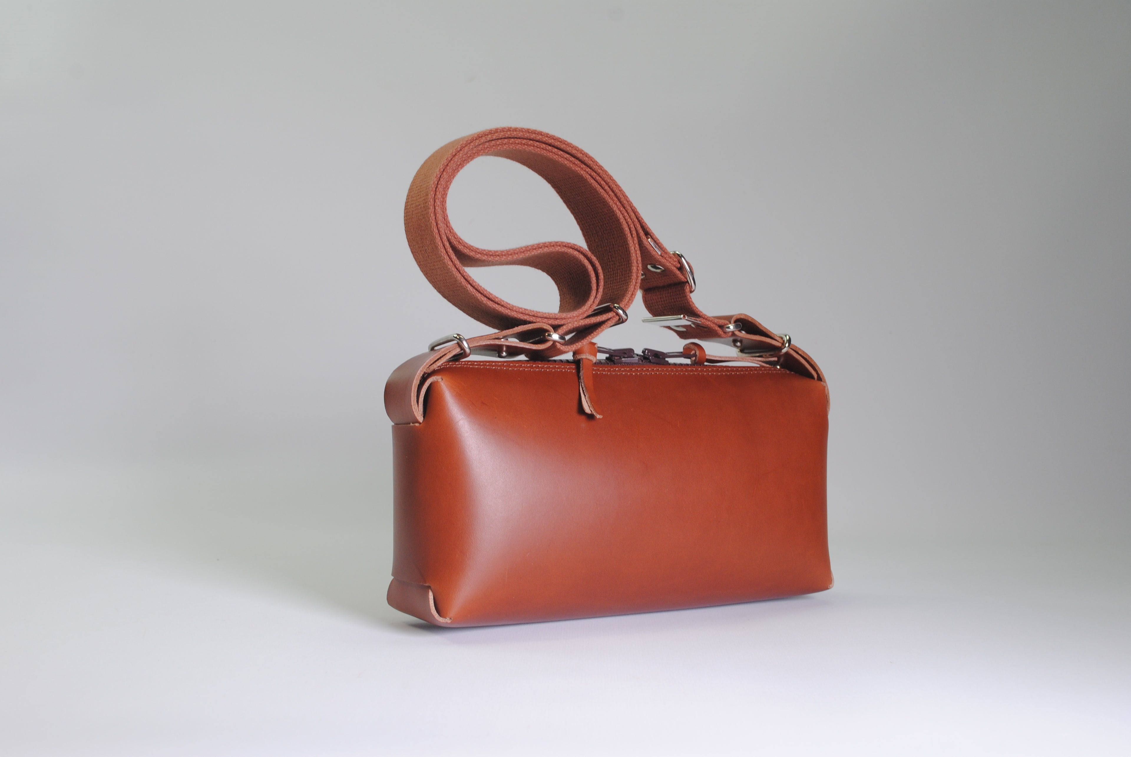 Panther crossbody bag leather carry zipper medium natural