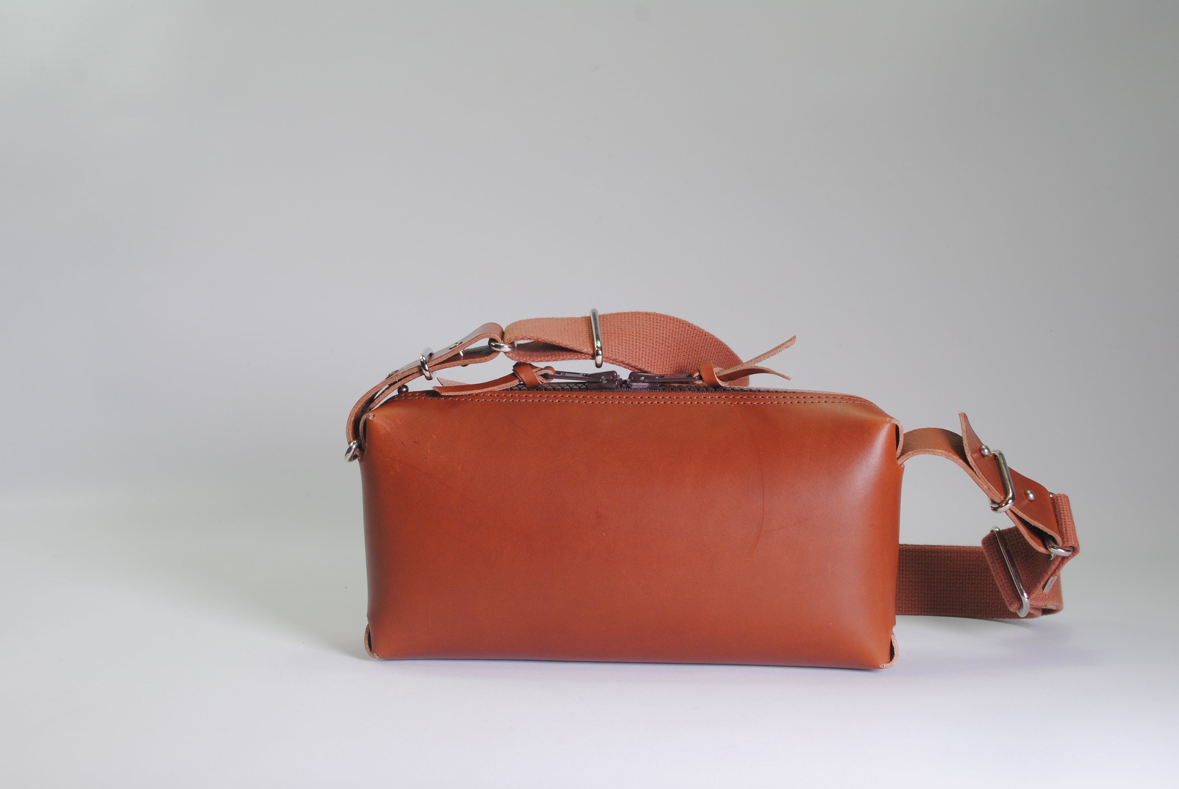 Panther crossbody bag leather carry zipper medium natural