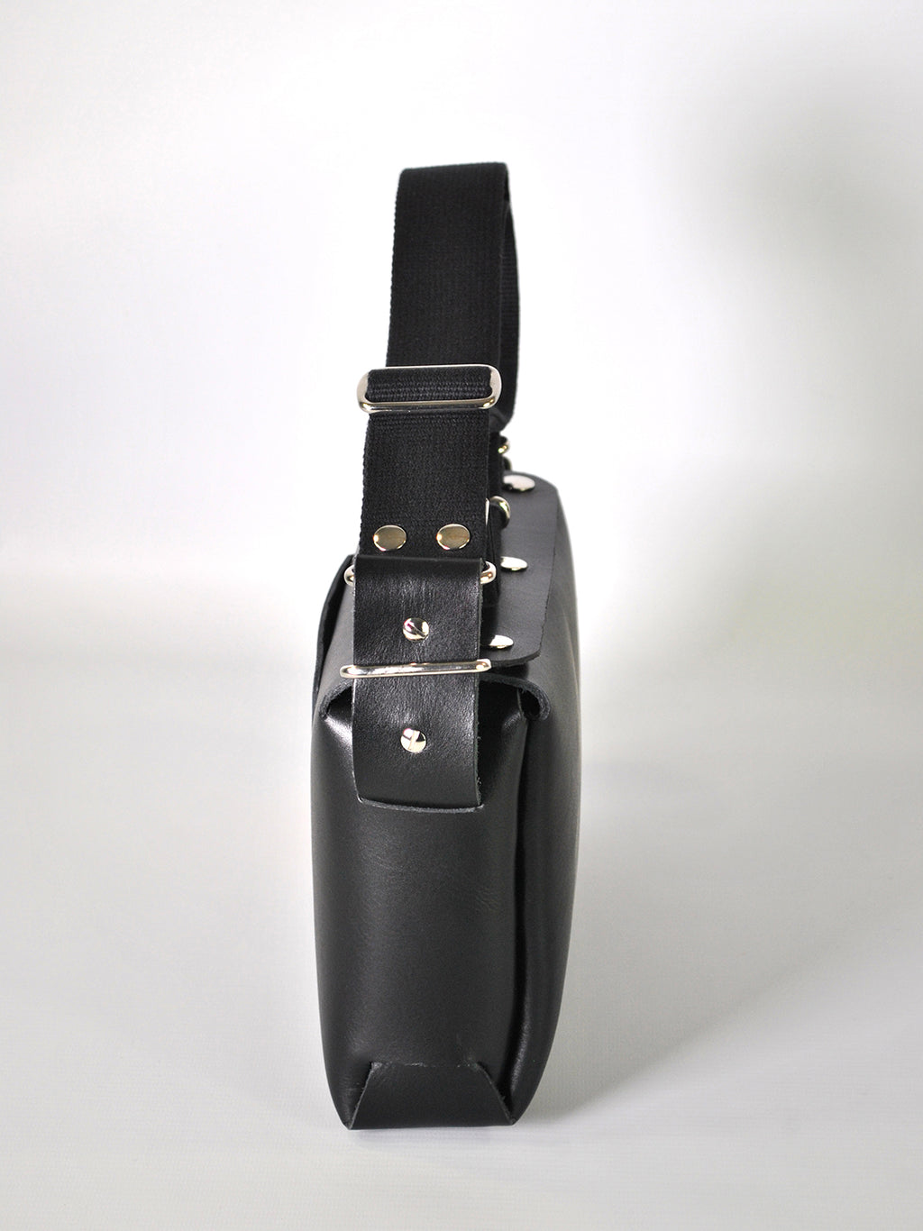 Black leather crossbody bag with silver hardware for everyday use