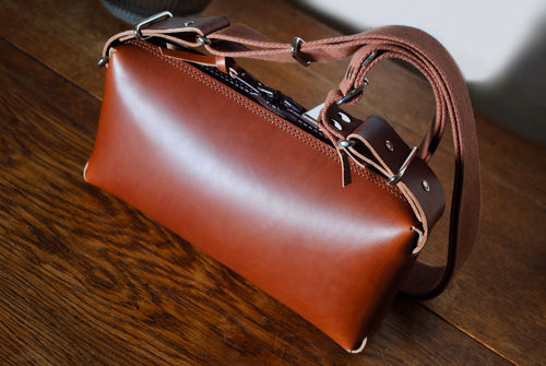 Panther crossbody bag leather carry zipper medium natural